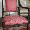 Rebuilt, re-covered antique armchair.
