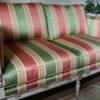 Antique reproduction loveseat with foam & down seats.
