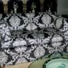 Re-covered loveseat with carefully matched damask pattern.